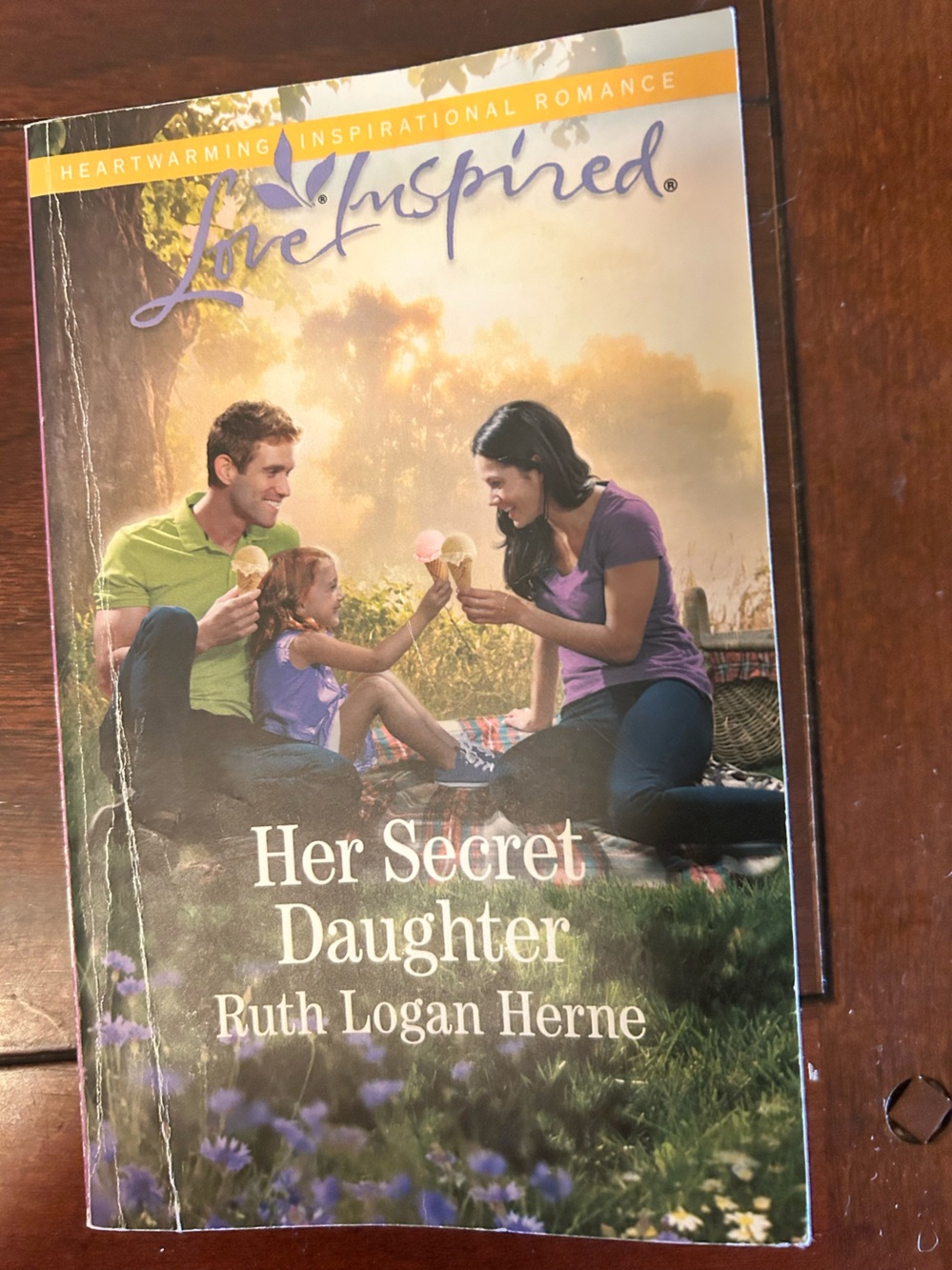 Love Inspired Romance Paperback "Her Secret Daughter" — Purple & Green Cover